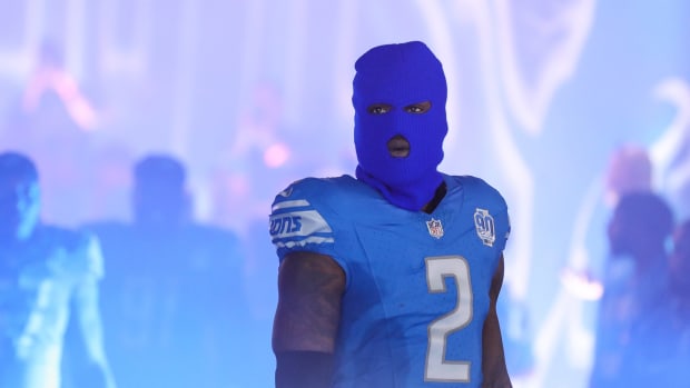 Gardner-Johnson, masked, prepares to take the field for the Lions' 37-31 overtime loss to the Seahawks on Sept. 17, 2023.